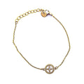 Bracelet fin doré réglable en acier inoxydable avec médaillon étoile et strass central